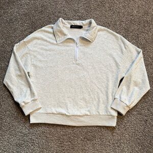Women’s light grey/white quarter zip sweatshirt. Small.